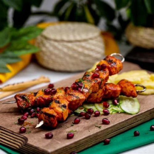 lamb-kebab-skewers-garnished-with-pomegranate-herbs_140725-1977